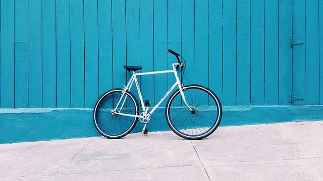 bicycle on blue wall
