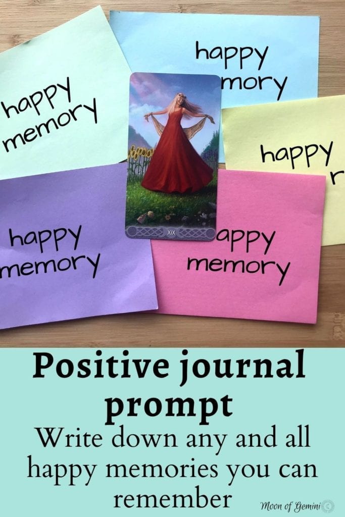 A positive journal prompt relating to the sun tarot card. Write all of your happy memories down so you can look back at them.